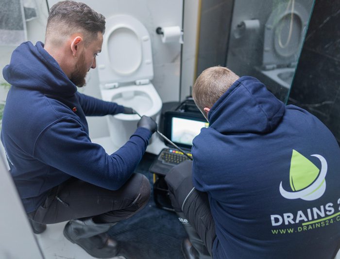 Drainage engineer carrying out repairs at a Southampton property
